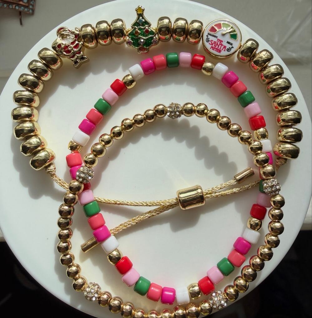 3 piece Christmas Baublebar bracelet set. 2 are stretchy and 1 is adjustable